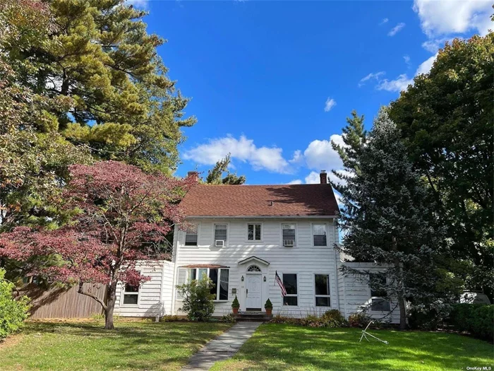 Fantastic opportunity in Manhasset. Four Bedroom Colonial near train, school and town. Located on a double lot, this property allows for subdivision into 2 building lots. This home features a formal living room with fireplace, entry foyer, formal dining, den and office, eat in kitchen and 4 bedrooms. A staircase leads from the second level to an unfinished attic which could be converted to additional living space. Restore this stately Colonial or build 2 new single family homes. As-is sale.