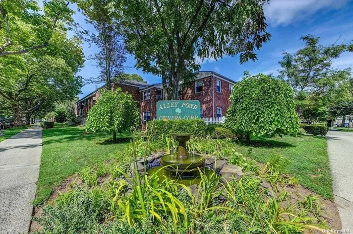 Beautiful courtyard unit. Large 1 bedroom upper. Open concept. Living room. Dining area and kitchen. Updated kitchen and bath. Washer/Dryer in the unit. Adjacent to Alley Pond Nature Preserve. Near shops, Expressways, Express bus to Manhattan. Q88 and Q27 buses. Outdoor parking. Pet friendly.