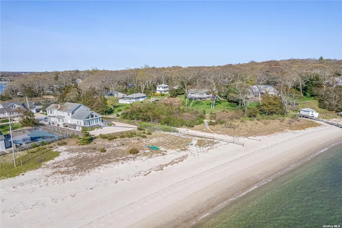 This beautiful Nassau Point home offers stunning bay views and is just steps away from Fishermans Beach. It features 4 bedrooms, 3 full baths, updated kitchen and bathrooms, wood floors and high ceilings - perfect for summer! The house has an approximate size of 2500sqft which is centrally located on the North Fork near award winning restaurants, fresh fish markets, farm stands and wineries. Perfect location for watching Wednesday night sailboat races or admiring sunsets over the bay. Imagine yourself waking up to the sound of waves and birds singing, having breakfast on the large sun-drenched patio overlooking the bay, taking a dip in the crystal clear waters at Fishermans Beach, then exploring all that nearby North Fork has to offer - from winery tours and farm stands, to fresh fish markets and award winning restaurants. Enjoy an afternoon sail or simply relax and take in the stunning sunsets. This is the perfect summer getaway! Call us today to tour this Nassau Point gem.