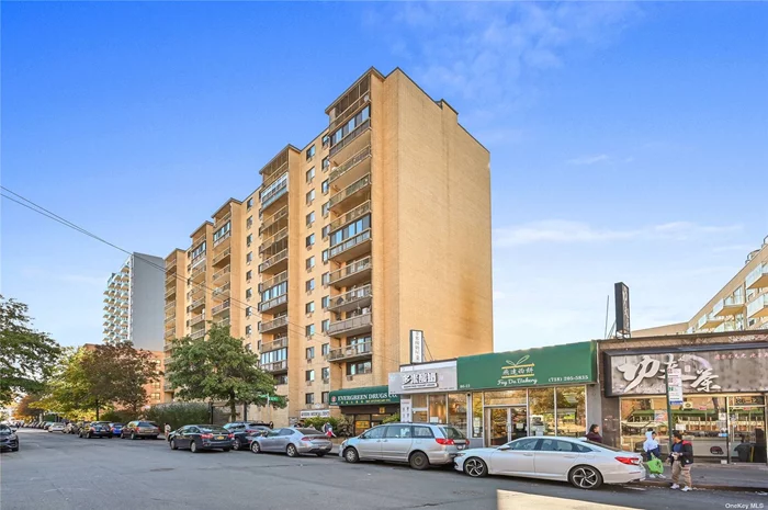 This perfect Junior 4 Condo (2 bedroom) converted from 1 features hardwood floor,  washer and dryer, a full bathroom, hardwood floor, and a balcony. The Queens Plaza Condo is an an all concrete building, right around the corner is the train and bus, the super market across the street along with Queens center mall within walking distance! This is perfect location with a full time doorman.