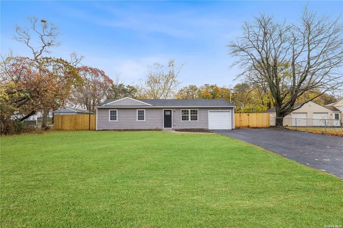 Beautifully Renovated Ranch has been updated with new Kitchen, Flooring, Carpeting, and a Great Living Room that features Cathedral Ceilings. The Two Full Baths a re completely renovated as well. A Must See!!