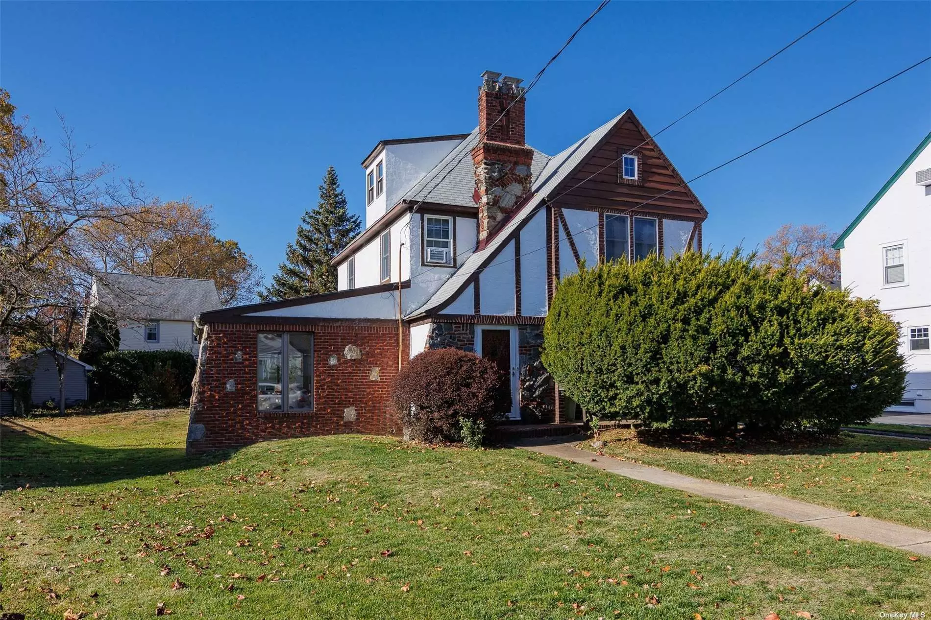 Great opportunity to make your own home in Rockville Centre! 3 bedroom Tudor with a large sunroom. So many possibilities! Pool size backyard!