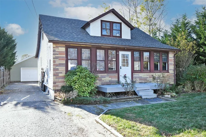 Welcome to 80 Cedar Street in Islip a very deceiving 3 bedroom, 2 full bath expanded Cape with many updates throughout including 2 new baths, Master on first floor with WIC and master bath, eat in kitchen, formal dining room, vinyl flooring, some new carpeting, full energy efficient heating system, updated electric in house and garage, roof 2 years old and much more. Massive 700 square foot garage with electric & wood burning stove for the contractor, car enthusiast or summer cabana. Move right in and add your own touches to make this home your own.