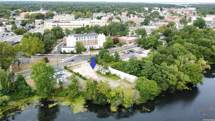 This property is located on .33 acres on Peconic River, with zoning in the Peconic River District. The lot is approximately 13, 504 square feet and has been leveled and cleared, providing a great opportunity for retail, restaurant, or commercial use. The property is located in the town of Riverhead, which is a prime location for water-based activities and is in close proximity to many other businesses and attractions. The property is currently connected to the Riverhead sewer district, which is a plus for commercial businesses. The previous owner had pre-approvals for a 40-seat riverfront restaurant in the past, but the application has since expired. However, the landlord is open to all options and the application can be renewed if desired. Overall, this property offers an excellent waterfront location in a prime commercial district, with many possibilities for use.