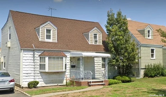 4Br 2 Bth Expanded Cape in need of Rehab. Second floor Rear Dormer, Harwood floors, Eik, and Fdr. Taxes after Star $6456.87 Tons of potential. Prime Cedarhurst location !!!