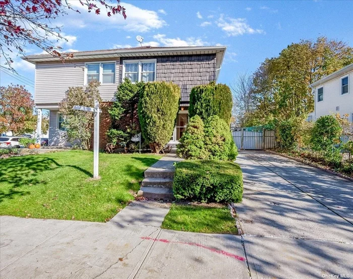 Move in ready semi detached one family features four bedrooms, bright living room,  formal dining room, finished basement. Private drive way. Buses Q12, Q13, Q27, Q31, Express bus to city. Close to all major highways, Northern Blvd, schools, shopping. #26 school district.