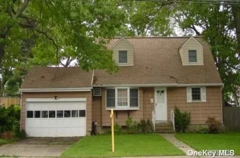 4 Beds, 2 Baths, Living Room, Dining Room, Back Extension. Older Roof, Needs Updating, Needs Repair.