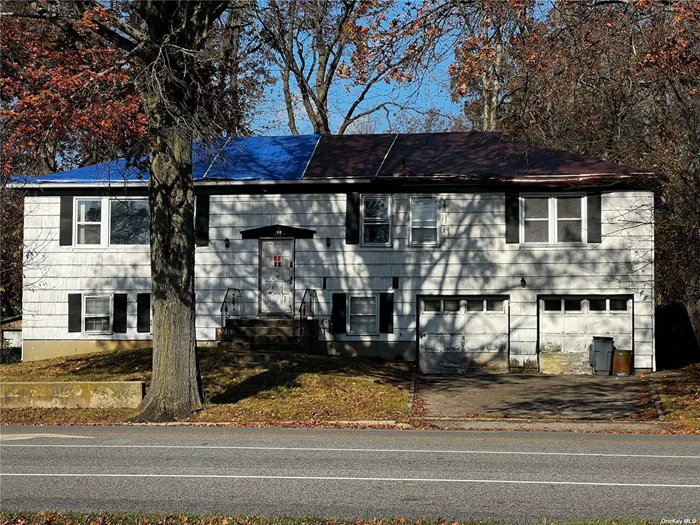 Large High Ranch with Spacious yard Conveniently Located Close To Public Transportation And Highways. Large Corner Property in Herricks School District.