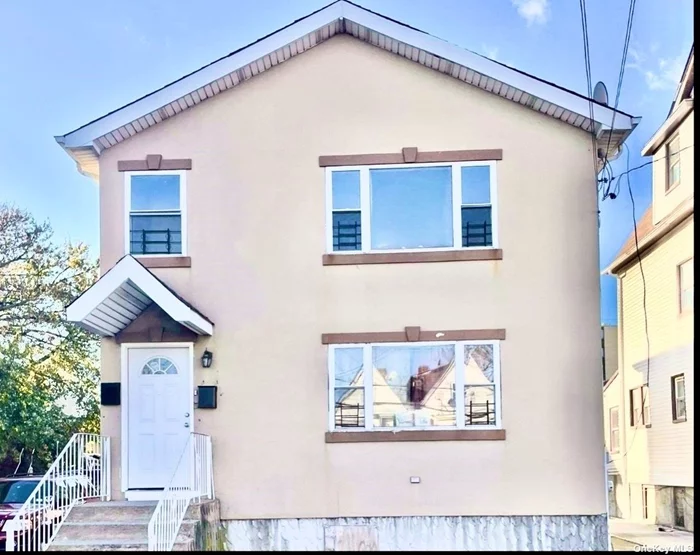 Welcome to Arverne ! Beautiful and spacious 3 Bedroom, 1 Full Bath Apartment which features An Open-Concept Kitchen, Wooden Floors, Living Room, and Dining Room. New Fridge and Stove. This Unit is on the second floor of a two-family home. MOVE IN READY