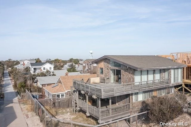 Great Location! Beautiful Ocean Views From 2 Decks. Includes Outside Shower, Separate Entrances, A/C Splits, 5 Bedrooms 2 Baths 5 Bikes, 5 Beach Chairs, Beach Umbrella, And Wagon.