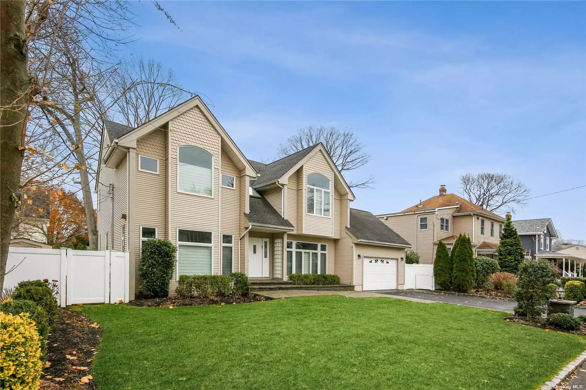 Center Hall Colonial, about 3, 000 Sq Ft of Luxurious Living Space, Sunken Lr & Den w/fireplace, oversized eat in kitchen, all Hardwood Floors, Central Air & Vac, 80 X 100 Property, 4 Bedrooms, 2.5 Baths, 2nd floor laundry. Deck, Private Cul De Sac Dead End Street Location, Roslyn Schools, Quality Construction, Private fenced in backyard with pavers and manicured lawn. Walk To Lirr. Landscaping Done. A wonderful finished bonus basement w/nearly 1, 500 sq ft. of usable space. This house has a wonderful opportunity for an expansion that can easily be done to make a huge primary bedroom.