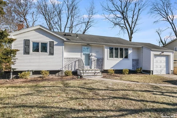 Welcome to 424 Commack Road. Move-in ready,  this newly renovated 3 bedroom 2 bath Ranch has a spacious layout and is inviting from the minute you walk in. Drenched with natural sunlight in every room. This home features newly stained hardwood floors throughout. The Kitchen has stainless steel appliances and Quartz countertops. Bathrooms have porcelain tiles and stainless steel fixtures. All New electrical 200 amp, wiring, plumbing, Insulation, AC, heating system and hot water heater. Commack School District. Close to transportation, restaurants and shopping.