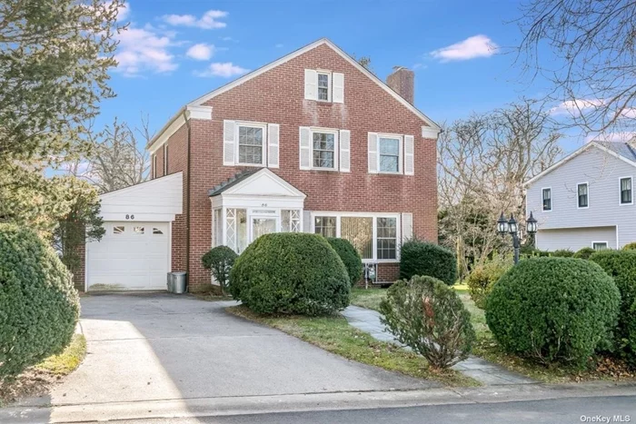 Welcome Home to this Beautiful Brick colonial located within the Incorporated Village of Plandome Heights and Manhasset School District. This home has been extremely well cared for and has so much potential. Sitting on a very spacious 9, 000 square foot lot, this home features: 3 bedrooms, 1.5 baths, gorgeous hardwood floors throughout, a natural gas heating system, a full house natural gas generator, central air, whole house dehumidifier, a living room with fireplace, formal dining room, large family room, attached one car garage, and full attic with plenty of space for storage. Additionally, there is a full basement with a large entertaining area and wet bar, large laundry area, and even more space for storage. An amazing opportunity to make this home your own!