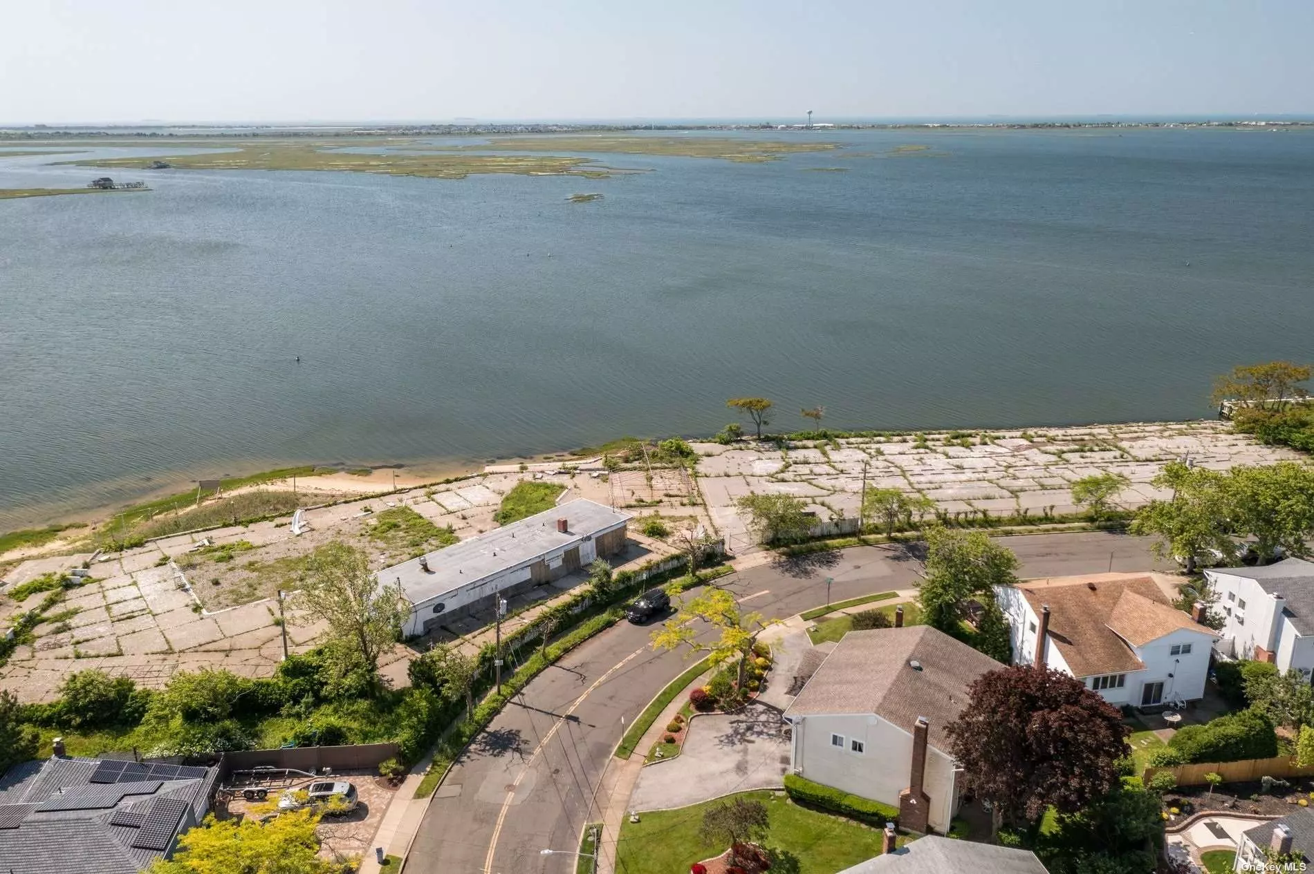 Magnificent waterfront property with unobstructed views of Middle Bay.