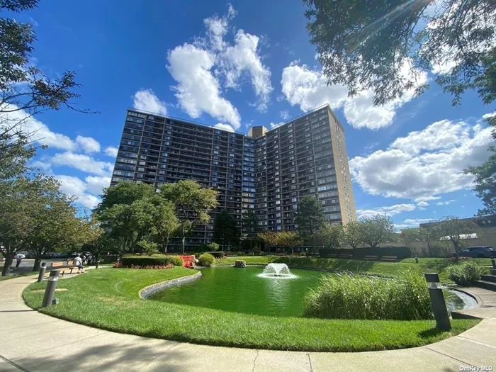 Southern Exposure with open view 2bed & 2bath on 19th Floor. Brand-new wood floor, updated eat-in-kitchen. Located at the FABULOUS Bay Club! Perks and amenities include: 24hour security, doorman & concierge, year-round indoor swim & fitness center, indoor parking, tennis, indoor/outdoor playground, on-premises restaurant, convenience store, hair/nail salon, dry clean services, etc. Great school district. AMAZING location! Walking distance to school and library, express bus route takes you straight to Manhattan! Convenient access to groceries and shopping!