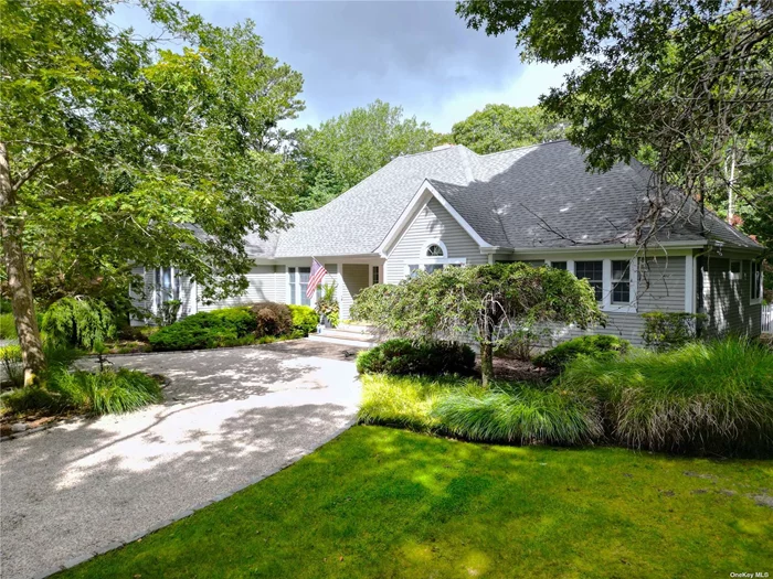 Luxurious and upgraded, this 3 bedroom, 2 bathroom home rests on a 1.15 acre lot on a peaceful block in Westhampton. Richly-appointed spaces include large gathering areas, a bright, professional-grade kitchen, spectacular dining room, and spacious bedrooms. Contemporary amenities including an EV charging station. The expansive backyard includes a shed, and room for a pool.