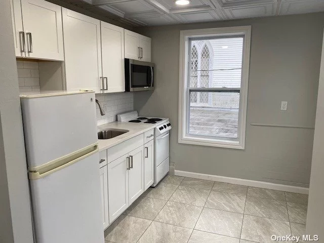 Beautiful New 2nd Floor Apartment in the Heart of Port Jefferson Village w Natural Light Streaming throughout. Parking Sticker provided with lease for Parking. Walk to Town, Shops, Dining, Ferry and Train. Less thank 1 Mile to Northwell and St. Charles Hospital 3 Miles to Stony Brook- ALL UTILITIES INCLUDED
