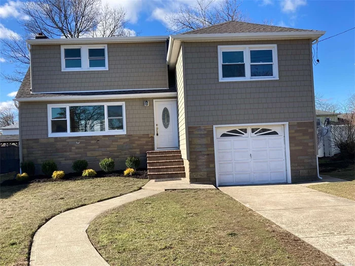 all redone raised split level features 4 big bedrooms new roof new siding new kitchen quartz countertops new appliances marble floor hi hats 2.5 new baths den finished basement large home lovely street newly done hardwood floors mint move in