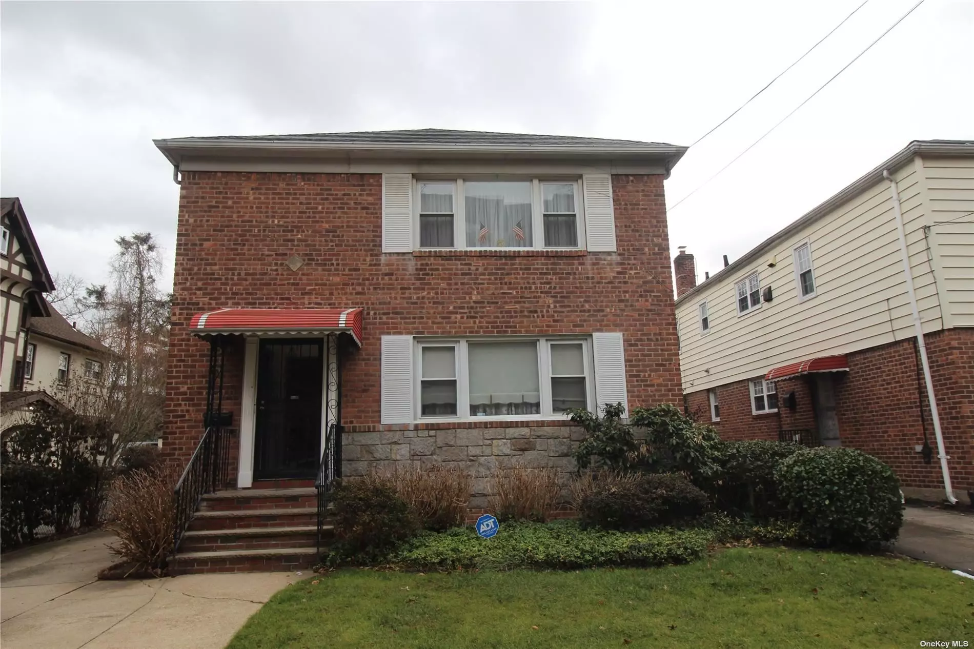 R4-1 ZONING - TWO FAMILY C/O. All Brick Residential/Commercial 3 Bedroom/1 Bathroom, LR, DR EIK (OVER) 3 Bedroom/1 Bathroom, LR, DR EIK. Finish Basement and Half Bathroom Family Room. Newer Oil Burner. Building Size 26 x 50 ( 1, 300 sq. ft. per floor ). LOT SIZE 41.33 x 137.50 ( 5, 683 sq. ft. ) Income Producing Home! Excellent Location. Minutes to Downtown Flushing. Bus Stop on Corner; Near Shopping. Large Back Yard can be Converted to a 8 Car Parking.
