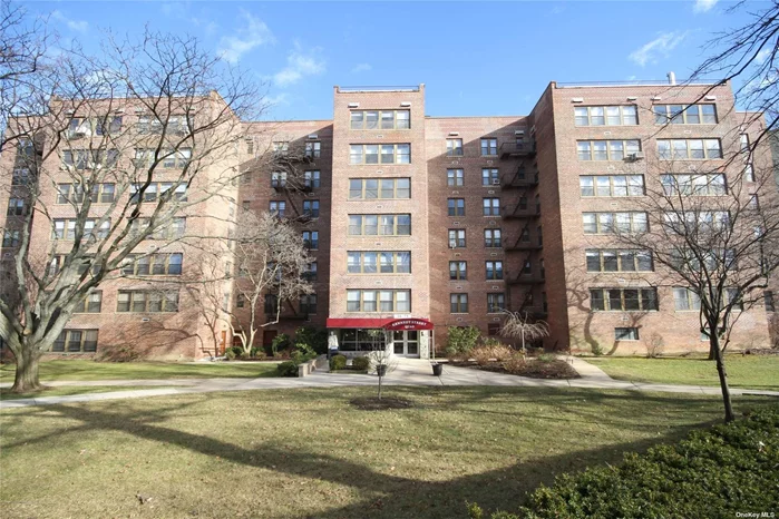 A Spacious, Sunny & Bright corner unit, that Lives Like a House, is waiting for you! Unit 2A is 1500 square feet, has reserved parking, a private playground & lobby level laundry. With a bright open and airy view, this home has 3 bedrooms with 2 full baths, closets galore, and hardwood floors. A separate dining room off the eat in kitchen creates a spacious home for easy living and hosting family gatherings. Located at The Kennedy Street Quad co-op in a park like setting, this home is a Must See! Walk to The Bay Terrace Shopping Center, schools, pool club, public library and more. The QM20 Express Bus to Manhattan is at your door, as well as the Q28 Bus to Flushing. This home is close to Bell Blvd., LIRR, restaurants and pubs too. Do not miss the chance to Live Large in a Great Community!