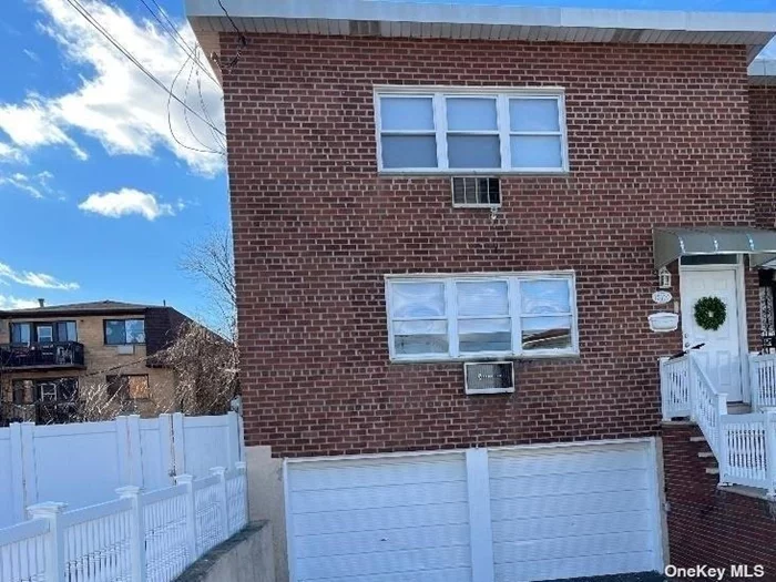 Great Investment opportunity!! Double Lot!! Legal BRICK 2 family with 2 car garaged parking and additional space for 4 more!! Renovated kitchens and bathrooms 3 bedroom over 3 bedroom apartments with spacious finished basement 2 zone heating New/ Installed window a/c units Big Backyard with new patio updated electric Close to Highway, express bused to nyc near
