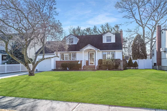 Mint Extended Cape in the heart of the manor near LIRR and school. Den extended with radiant heat. Seaford Manor prime/quiet dead-end block. Party yard with pool. New Hot Water Heater. Attic Storage in Garage. Irrigation system. 4-zone sprinkler system