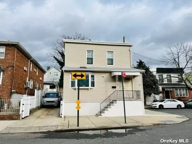A true Gem. Tastefully renovated 2 Family corner home with huge private yard. Parking for 3 in a side private driveway. Updated, upgraded, duplex on the first and lower floors. Move in ready. With fantastic space for family and friends. Direct access to a private yard. 2nd floor unit will be delivered vacant as well.
