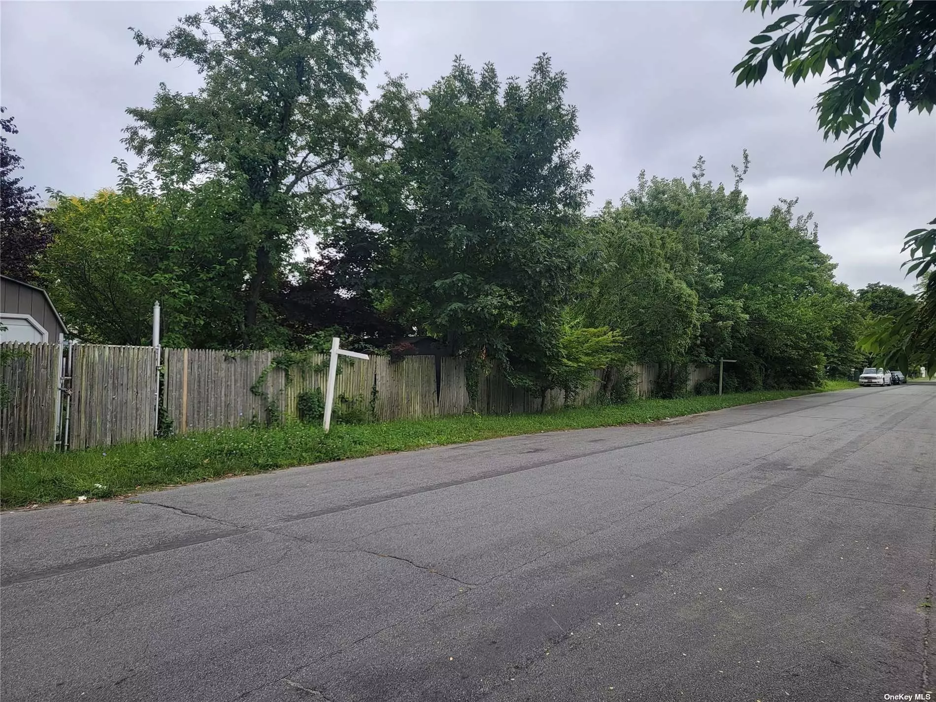 Property consists of 3 Separate deeded Lots of Land, 59 X 47, 61 X 47 & 60 X 47 Total 47 X 180 Land Has Many Leyland Cypress Shrubs For Privacy. 2 small Sheds and a garage/shed. Total Street frontage is 180&rsquo; and sewer lines are in street.