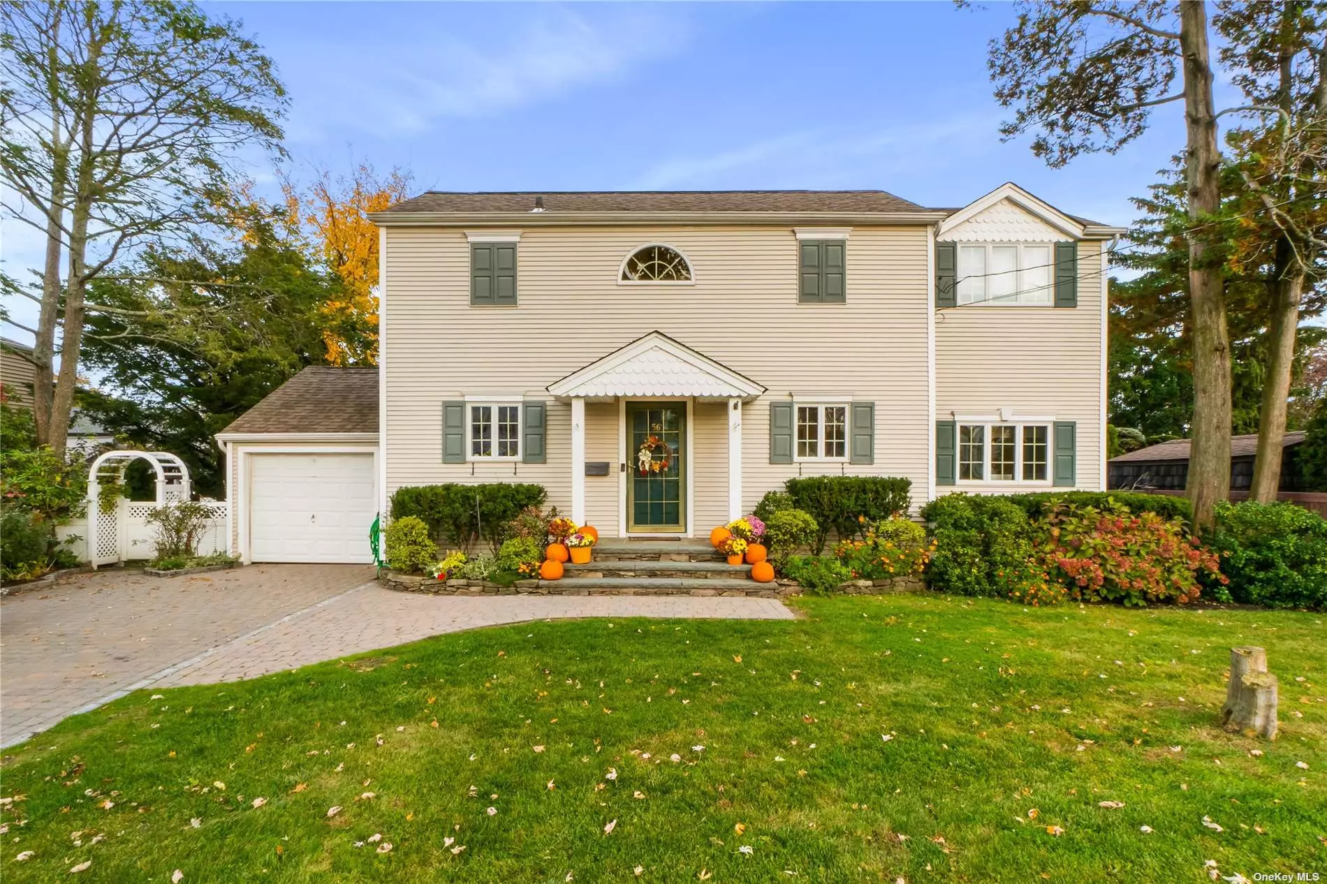 Charming and picture perfect! This colonial is situated on a gorgeous block in the Greenways section of Manhasset Hills. Updated and super clean, this home offers hardwood floors an updated kitchen with granite counters, dining area with sliders to the large back yard. The first level is completed by a formal living room and an additional room that is currently being used as an office. The Second level has a primary bedroom with a vaulted ceiling and two additional bedrooms and a full bath.. There is a partial basement with ample storage, utilities, laundry and additional space. The exterior landscaping is beautifully maintained. Conveniently located to shops, highways, transportation and more! Herricks School District.