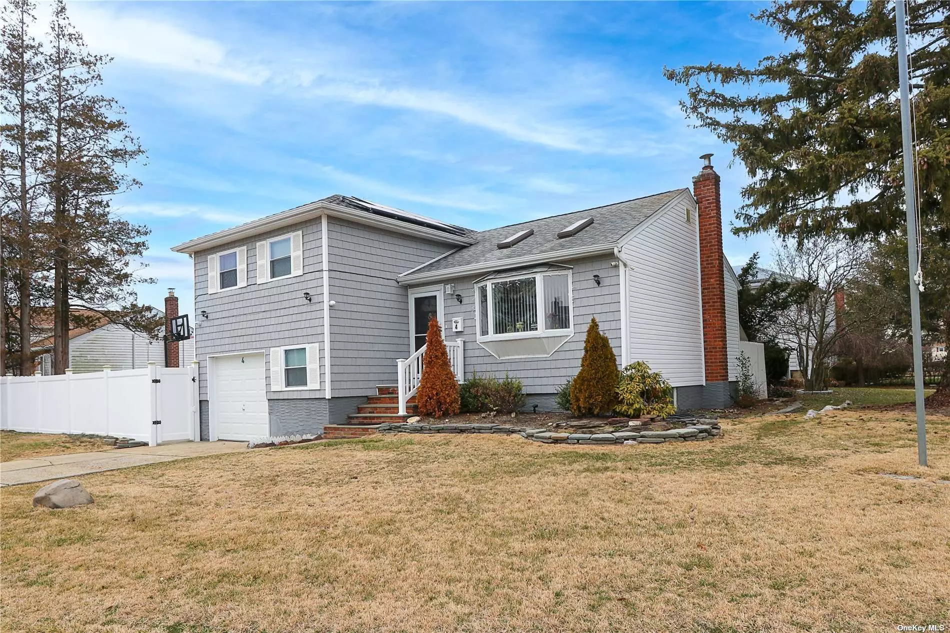 Do not miss out on this new split level (2019). 4 bedrooms, 2 full baths, full finished basement on ground level with outside entrance, vaulted ceilings. Full Basement with Barand Huge Backyard. Solar Panels. Great location. Convenient to everything. Will not last long!