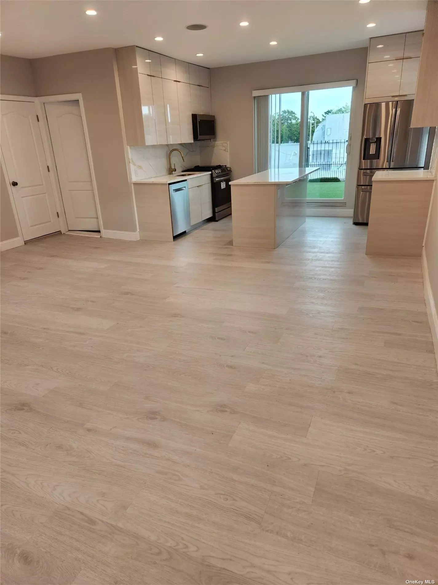 Cost was no option on This Spectacularly Renovated 2 BR, 1Full Bath, Super Spacious + Contemporary Apartment. Bright + Airy, Including the Finest Appliances! Double Sink, Gorgeous Full Bath, Gleaming Wood Floors and Washer/Dryer!!!