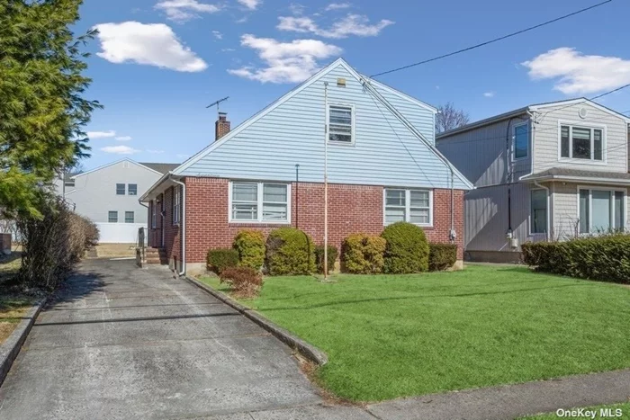 This lovely cape style home is perfectly situated mid-block on a quiet tree lined street. The home features a spacious living room area that is completely open to the dining area. an eat-in kitchen, a full bathroom and 2 nicely sized bedrooms. The second floor offers a spacious primary bedroom and an abundant amount of storage space. The full unfinished basement provides a laundry area and additional storage space. The highly desired Roslyn school district, the low taxes and the proximity to shopping and transportation make this the perfect place to call home!