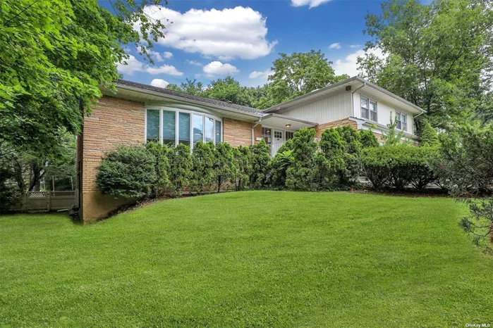 Open concept modern home ideally located on residential street close to town, LIRR, worship. GN Estates is a private village with private pool, tennis and waterfront playground.