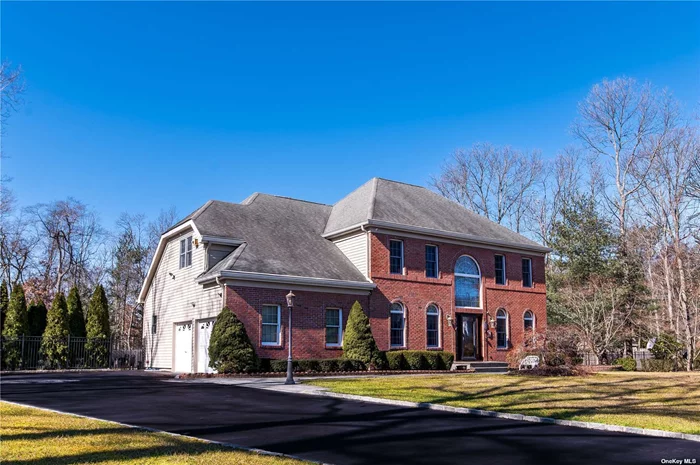 Welcome home to this magnificent estate, set on a Private Builders Acre. A True Center Hall Colonial with all the amenities! The EIK is equipped with stainless steal appliances, all Energy Star. Cherrywood Custom Cabinetry and Italian Avonite counter tops. Large center island and Garden window that looks out to backyard. With a Family room that flows into Kitchen truly makes this the heart of the home. Crown moulding throughout first floor. Formal Living room & Dining room. Laundry room/Mud room. All Baths updated and Masterbath has/Jacuzzi tub. All Hardwood Floors. Central Vac, Chandelier in foyer. Cambridge paver patio for entertaining, and so much more. The list goes on!!! Low Low Taxes(w/Star$14, 620.25) Hauppauge Schools