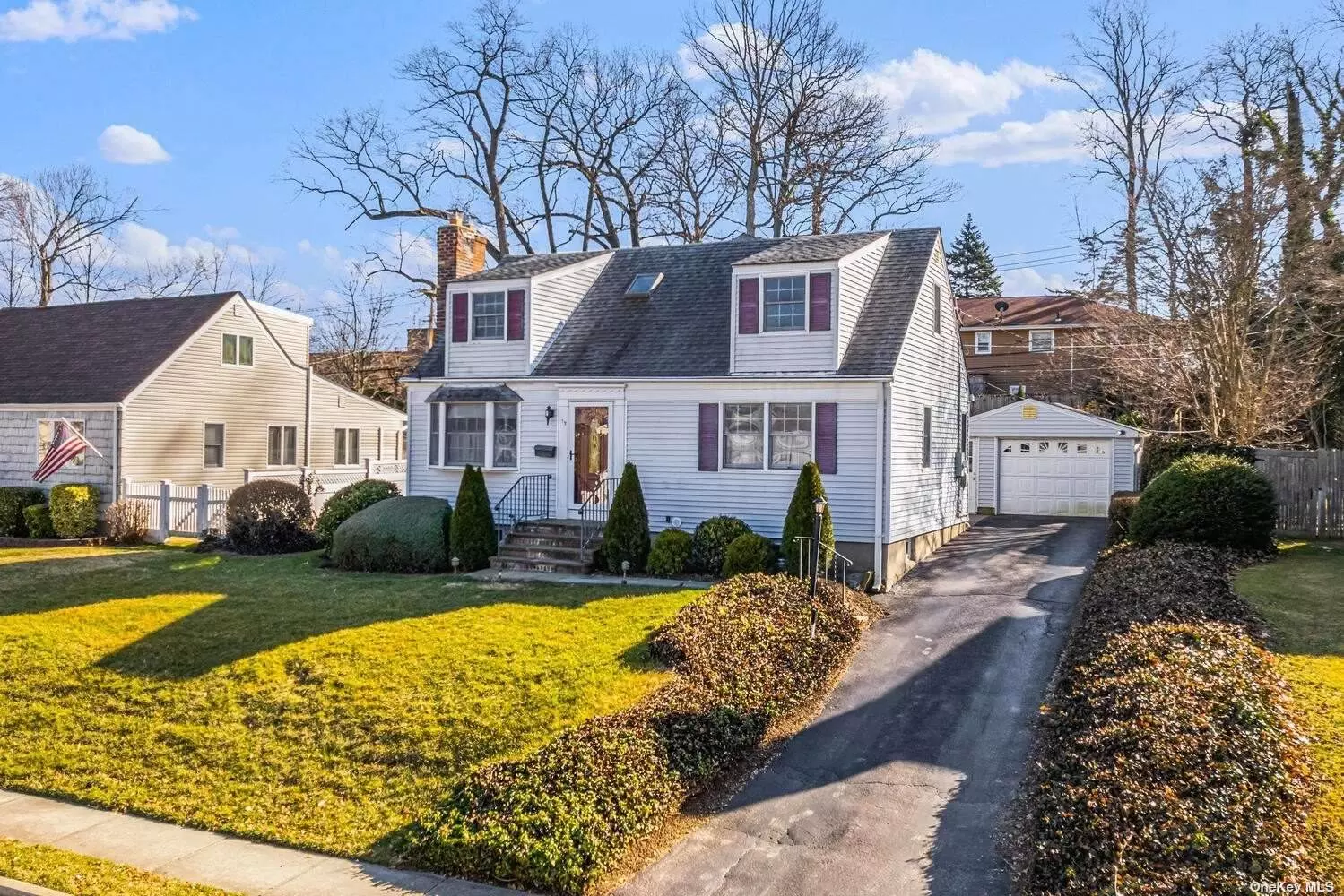 Welcome to this bright and cheery 4BR/2Bth Cape located in the heart of Glen Cove. Enter into the sun-drenched living room with wood burning fireplace that flows into the expanded eat-in kitchen - perfect for entertaining. First floor primary bedroom plus one additional bedroom and full bath on the first level. Two large-sized bedrooms are located on the second floor with an updated full bath. Bonus space in the basement for home office or rec room. Beautifully landscaped and fenced in property with retractable awning and inground sprinkler system. The large one-car garage provides extra storage. Close to schools, shops, LIRR, and restaurants. Less than 30 miles to NYC. Low Taxes $8, 811.26