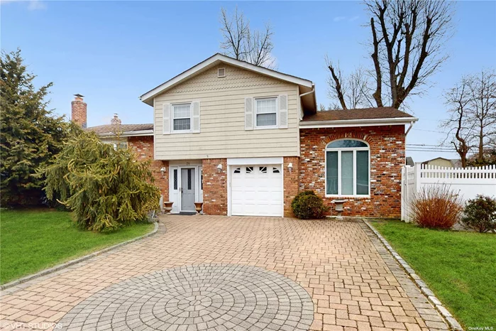 Beautifully Updated and Expanded, This Meticulously Maintained Split Level Home Sits on More Than a Quarter-Acre of Land with Professional Landscaping, Privacy Fencing, Flower Beds and Mature Shade Trees. Gorgeous 20X22 Extended Great Room with Vaulted Ceiling Leads to a Sprawling Deck. Four Finished Levels of Great Living Space Including a Guest Suite in its Own Wing. Located Blocks Away from the Long Island Sound this Beautiful Home is Close to Village Shopping, Public Beaches, Railroad, Golf and Boating Facilities.