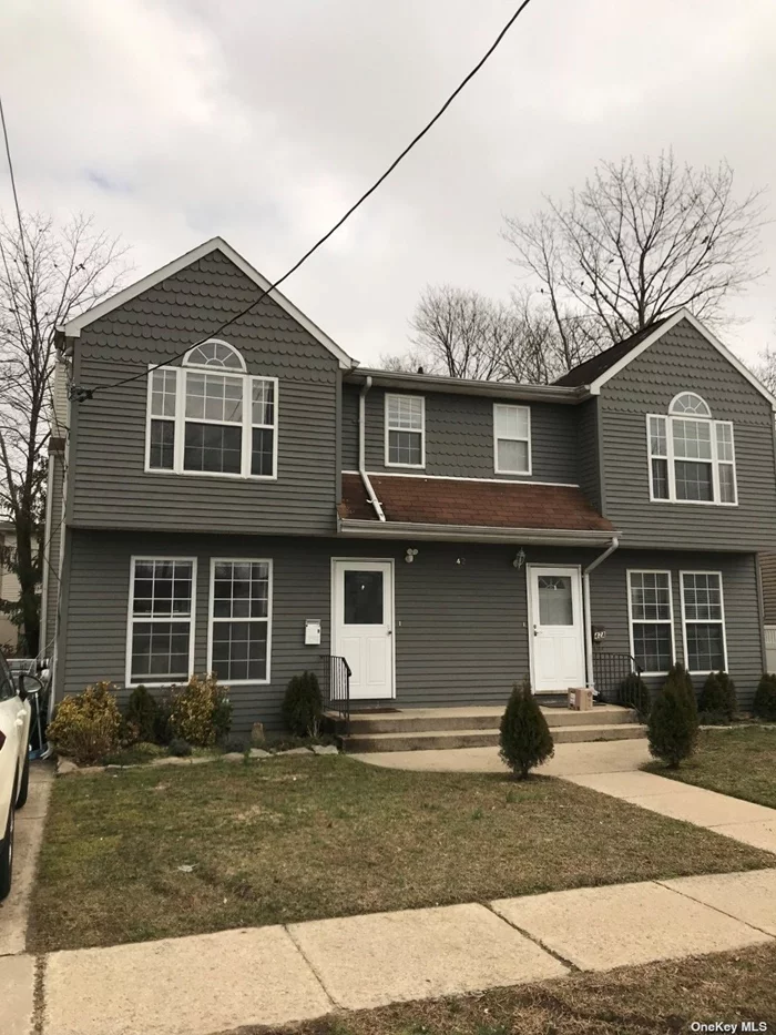 Updated Spacious Triplex. Eat in Kitchen, Living/Dining Room W/ Fireplace. 3 Bedrooms, 2.5 Bathrooms. Full Finished Basement W/ Washer and Dryer. 2 Car Off Street Parking.