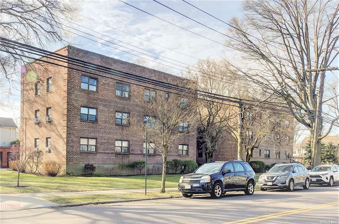 Beautiful 1 BR Coop with private storage in a prime location of Bayside, Queens. Located on the top floor, this unit features a spacious living/dining room, renovated kitchen with dishwasher, renovated bathroom, king size bedroom, hardwood floors, high ceilings and unobstructed views. The building features on-site laundry, parking, secured entry, and much more. Location is ideal as the building is surrounded by residential homes. This makes for ample street parking availability and gives you a sense of suburban living while still being in the city. Bustling Northern Blvd just 1 block away and the trendy Bell Blvd just 7 blocks away. No shortage of restaurants, shops, stores, and nightlife on Bell Blvd. Coffee shop, bakery, and convenience store all within one block. The popular Crocheron Park also just 1.5 miles away. Easy access to Manhattan via LIRR Bayside station (8 blocks away) and Q12 on Northern Blvd provides direct access to Flushing Main St Station. So much to list. Apartment has been freshly painted and cleaned nothing to do but move right in!