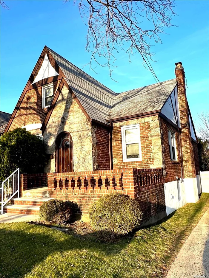 This beautiful 4 Bedroom All Brick and Stone Tudor Style single Family Home has a Front Porch with a Detached One +Car Garage and a long Driveway and is located in School District #26. The First Floor features 2 Bedrooms, a large Full Bathroom, and an Eat in Kitchen, a Living Room with a wood burning Fireplace and a Formal Dining Room. The gleaming hardwood Floors have inlaid Mahogany borders, A solid wood staircase leads to the 2nd floor where you will find 2 more Bedrooms with high ceilings, a large Full Bath as well as 2 6&rsquo; x6&rsquo; Cedar Closets and Attic Storage. The basement has a separate large finished Recreation Room and a Laundry/Utilities Room with a large workbench. It is an airy home, clean and freshly painted inside and out.The lovely fenced in backyard is great for BBQ&rsquo;s