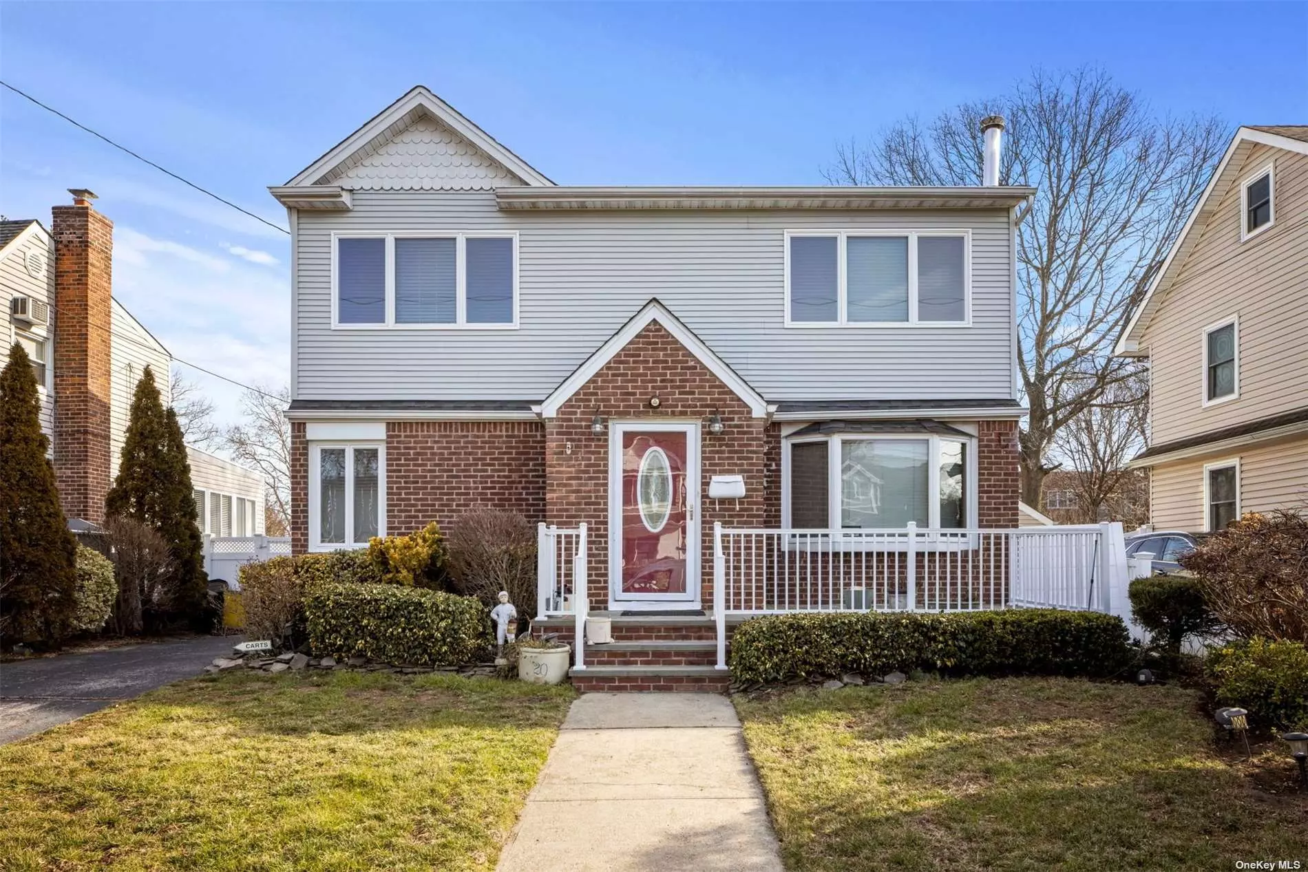 A well kept dormered Colonial with 5 BR and 2 Full baths, Hardwood Fls t/o 1st level.Eik which flows to a large open-concept den w/ plenty of sunlight, most of house is Andersen windows, 3 zone Gas heating, Master BR 15x30, Ultra Bath with Jet Massage, Split level ductless on 1st FL, HW tank 2 years old, All EE star appliances, Double pane windows, Brick Fireplace, Slate porch in front , Concrete patio and pavers in back, treated lumber deck, Bright Basement,  refrigerator is 8 months, Dryer is 3 years, quiet block, school district 14, low taxes, close to homes of worship, shopping, and LIRR. After Star taxes are 14, 128