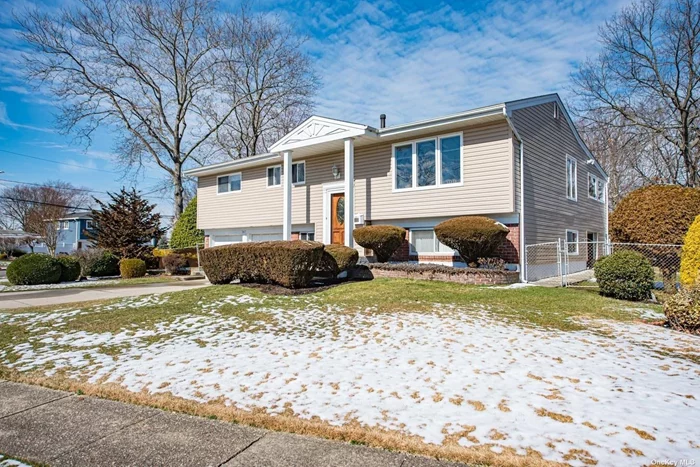 Spacious & Spotless Wideline Hi-Ranch in sought-after Westside location. Numerous updates and in MOVE-IN condition. Hardwood floors on the 2nd level. Custom-built sunroom off kitchen with LOTS of windows.