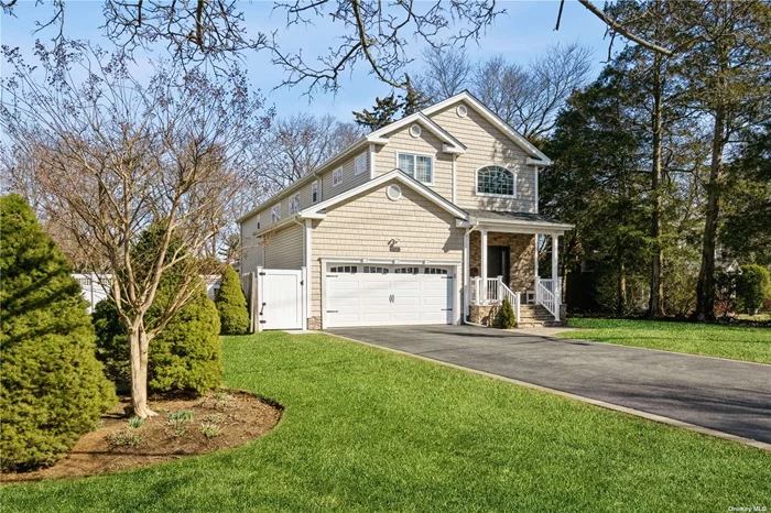 Beautiful 4 year young colonial with dramatic 2 story foyer, oversized rooms, hardwood floors throughout and a stunning gourmet kitchen with quartz countertops, undermount lighting and designer stainless steel appliances. The backyard is equally impressive with a heated saltwater, gunite inground pool including interior lights, seating area and bench. A built in BBQ, fire pit, surround sound and landscape lighting throughout complete this backyard oasis. Close to town and the LIRR. Award winning Syosset school district.