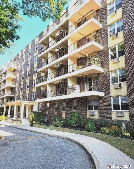 BRIGHT FRONT CONDO!!! Large living room, and 2 Bedrooms 2 full baths. At night you can see a beautiful whitestone bridge. Great location. Close to all. 2 car Parking are available for a fee. Walk to Subway, Bus, \ LIRR Laundry room, meeting room,  in-ground community pool.