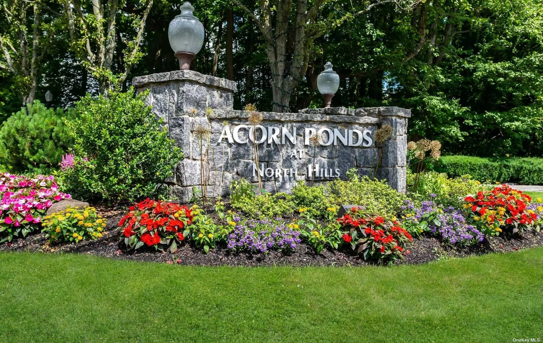 STUNNING. This Acorn Ponds Buttonwood model home was Completely Renovated in 2023! Bright and Sun-Filled with an Open Concept LR/Dining Room Area and Custom Euro EIK w/Stainless Steel Appliances. The upstairs En-Suite Primary Bedroom has a huge Walk In Closet and Luxurious Bathroom w/Designer touches. There is an Additional Bedroom and Dreamy Full Hall Bathroom. Private Patio, Attached 2-car garage and so much more. Perfectly Located on a quiet tree-lined Courtyard in the Heart of the Community w/Southern Exposure! Enjoy Resort-Style Living in this Fantastic Clubhouse Community that has every Amenity. Close to Everything. Available now!