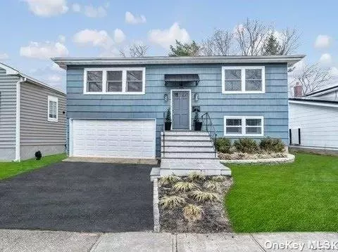 Gorgeous newly renovated open concept 4 bedroom, 3 bath home. Large gym recreational area and office. Just upgraded central air-conditioning and heating system. Beautiful newly fenced in yard and plantings.