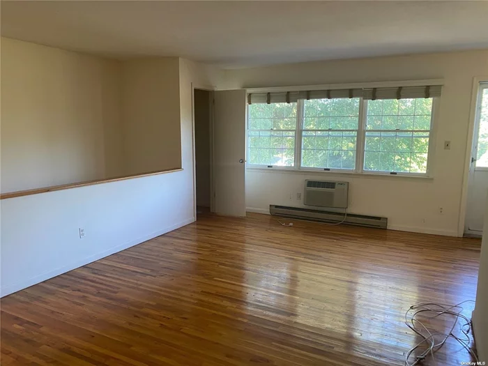 Beautifully updated oversized 1 bedroom apt. with 1 bath, updated kitchen, dining/living room, washer/dryer, and private balcony. overlooking the port washington creek