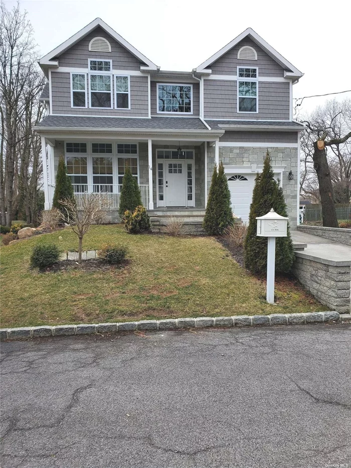 Like new 4BRs, 2.5 baths with waterview of Mill Neck Creek. Cathedral entry foyer. Gas fplc in den, hardwood floors, quartz countertops, energy star appliances, security alarm, CAC, SS appliances, ceiling fans as shown, sliders to deck. Beach rights to Mill Creek beach. Landlord pays lawn maintenance & water.