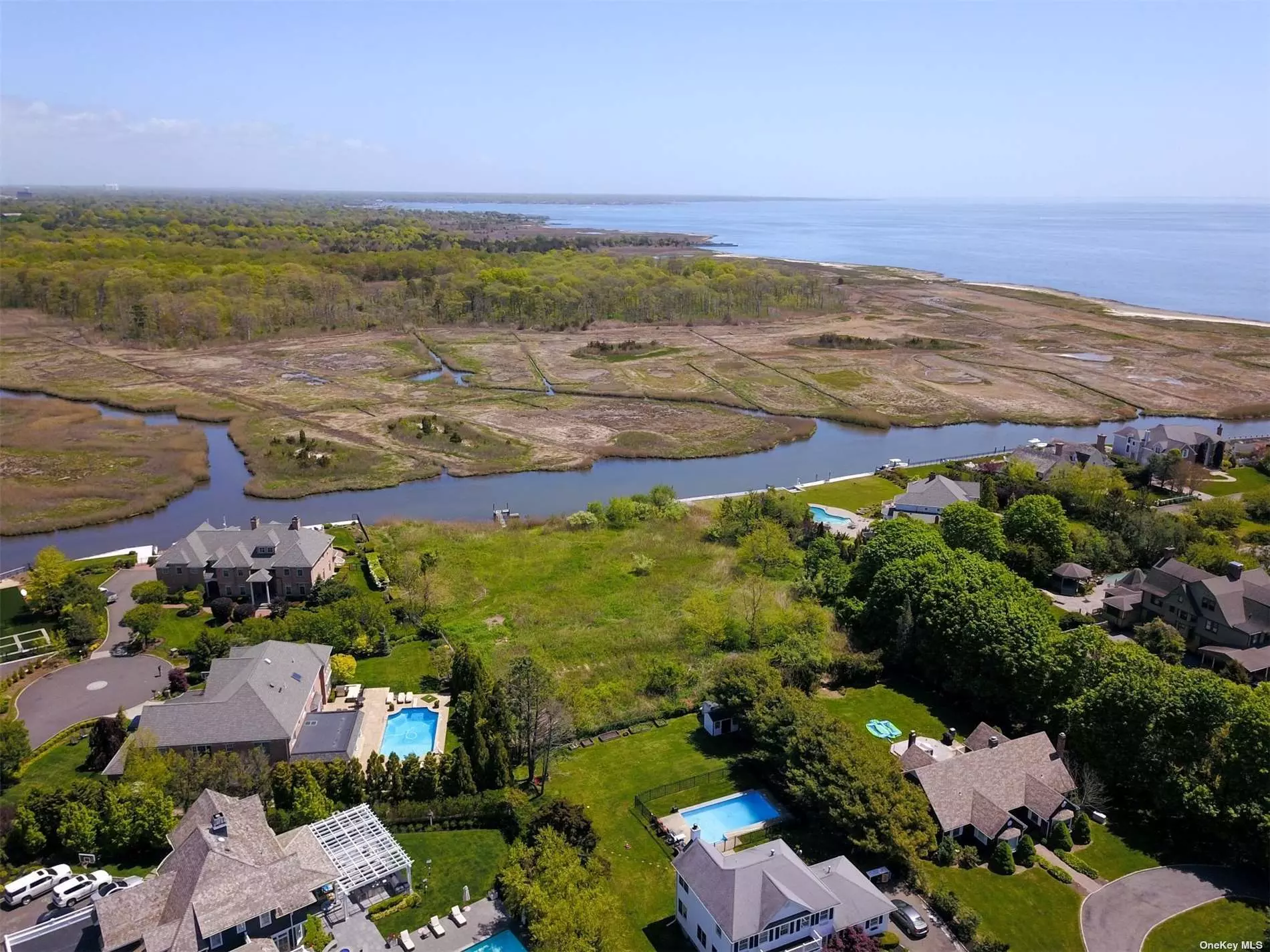 A land opportunity like you&rsquo;ve never seen before, and never will again! A TREMENDOUS 1.6 Acre lot with over 220 feet of waterfront on Trues Creek, and stunning, uninterrupted views over Gardiners Park. And now after 2 years of planning and application, a 5, 000 square foot masterpiece is fully approved to be built! The purchase of this land includes all the architectural plans and municipal requirements, and is shovel ready NOW! This is the last undeveloped piece of waterfront land around for miles, and certainly is the best for last! Build your dream here!