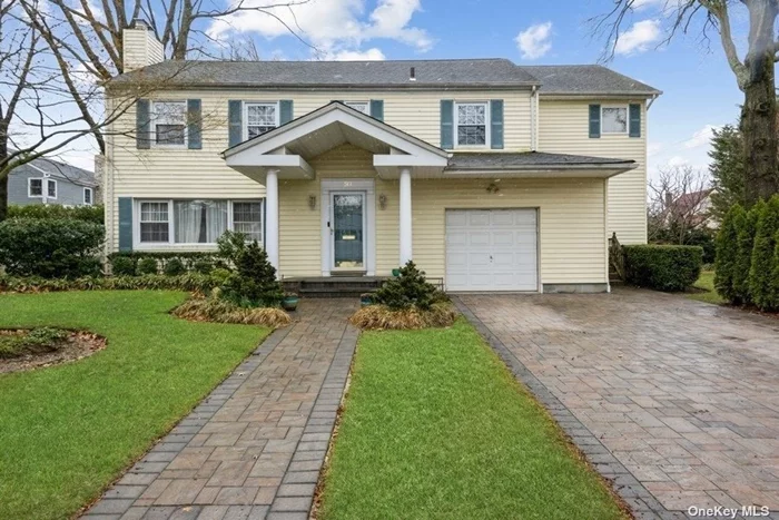 First time on the market! Welcome to this fabulous colonial home. The beaming sun shining through the skylight in the entry foyer leads to an impressive and bright open eat in kitchen with large center island, truly the heart of the home. High ceilings and skylights that let in brilliant sunshine. Patio is the perfect place for your morning coffee or a fun BBQ. Kitchen flows beautifully into the Den with access to the yard, great for entertaining. Formal living room is elegant and inviting. Grand formal dining room with wood burning fireplace. Separate side entry with huge closet and mudroom area. Wood floors throughout. Full bathroom and access to the attached garage complete the first level. Expansive primary bedroom suite has sitting area, en-suite with jacuzzi tub, make up vanity/dressing area and walk in closets. Second bedroom has it&rsquo;s own full bathroom, Hallway bathroom, two additional bedrooms and hall closets complete the second floor. Full spacious finished basement with laundry room and multiple rooms for play room, gym, or whatever meets your needs. Deep closets, great for storage or just hiding clutter. Basement has it&rsquo;s own private entrance (egress). Great yard, large flat property to enjoy with family or guests. Whole house generator! Great location near park and transportation, close to all. Part of the Great Neck Park (Parkwood) District. This house is a must see, won&rsquo;t last on the market.