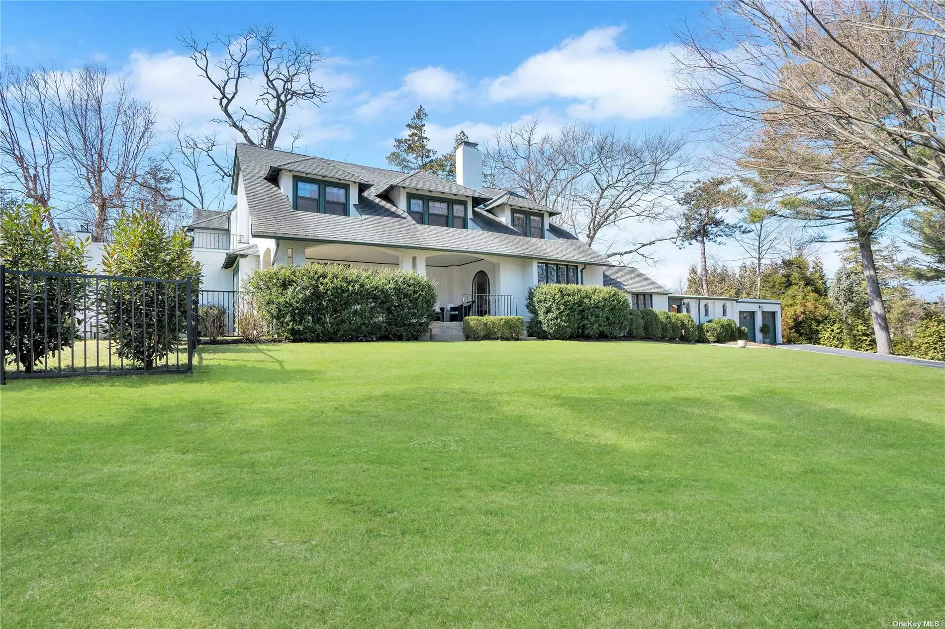 Nestled Within The Bucolic, VILLAGE OF PLANDOME, a 4500+ sq ft Mediterranean Style Home w 4 Bed/4.5 Bath on .54 Acre Room For Pool. Large Patio & Cobblestone Courtyard w/Covered Portico Leads To The Cottage - a Unique, Stand-Alone Structure Currently Used as a Home Gym/Office w/Fpl, Wet Bar & Full Bath, Full house Generator. Beach & Mooring Rights to Plandome Field & Marine Club incl Tennis for a Fee. Close to town & LIRR. Opportunity to Own a Truly Special, One-of-a-Kind Residence.